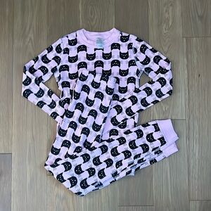 Hanna Andersson pink with black cats pajamas. Size 10.